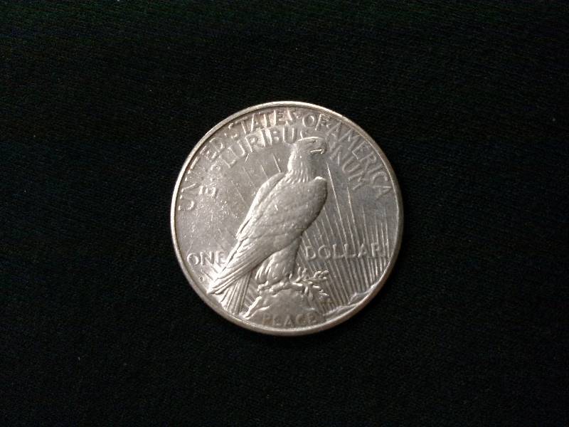 lot 72 image: 1925 S Peace Silver Dollar...