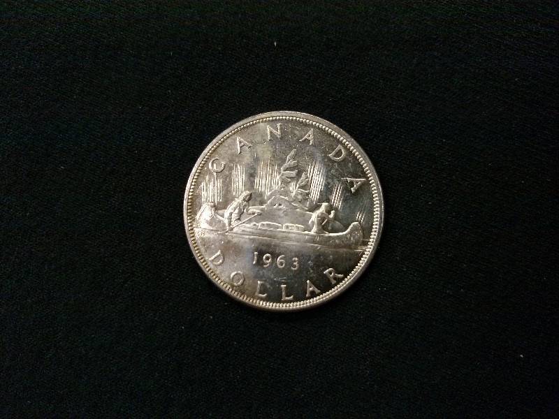 lot 101 image: 1963 Canadian Silver Dollar .80 Sil...
