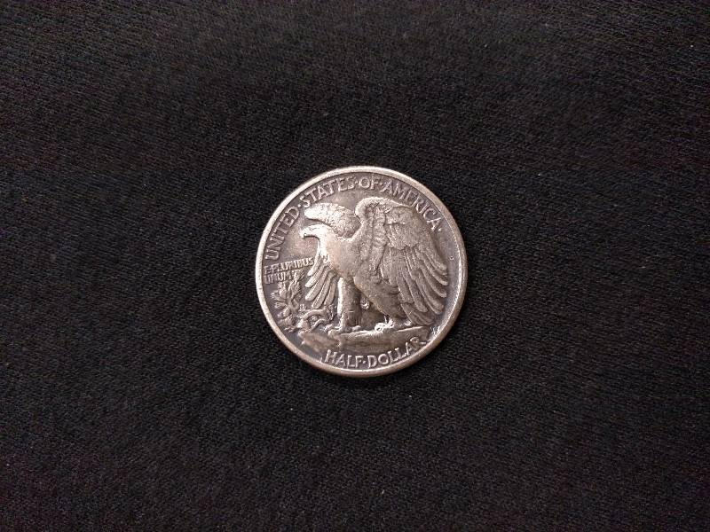 lot 104 image: 1942 Walking Liberty Silver Half Do...