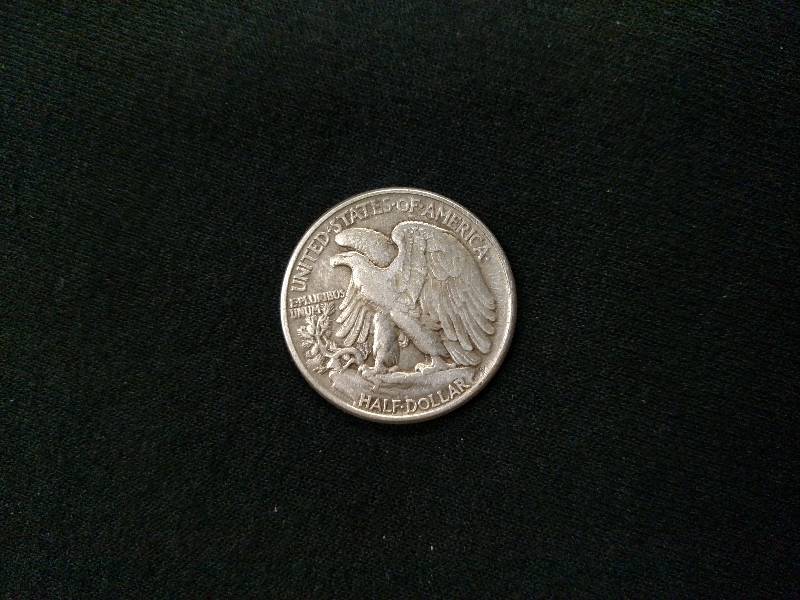 lot 106 image: 1944 Walking Liberty Silver Half Do...