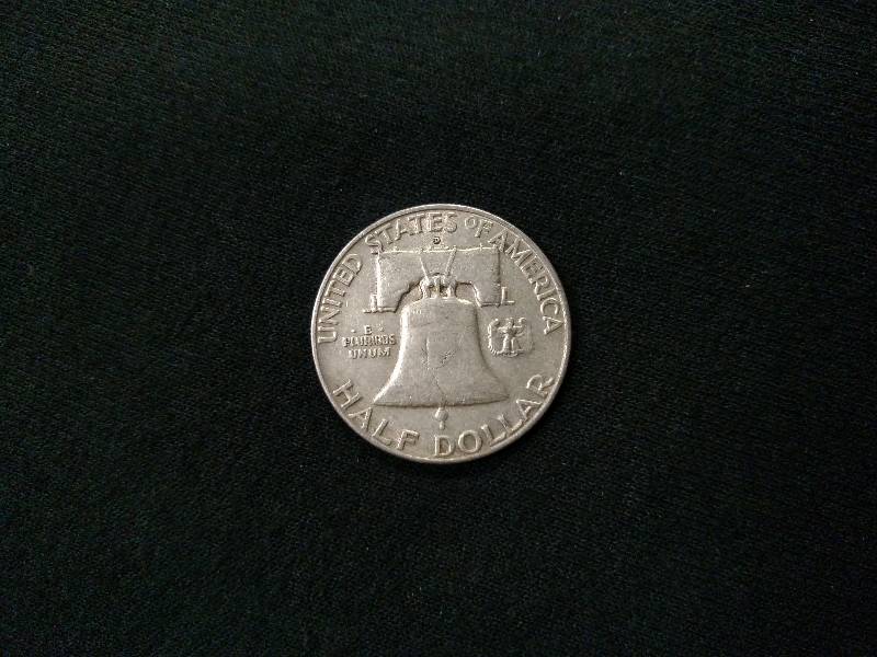 lot 111 image: 1957 D Franklin Silver Half Dollar...