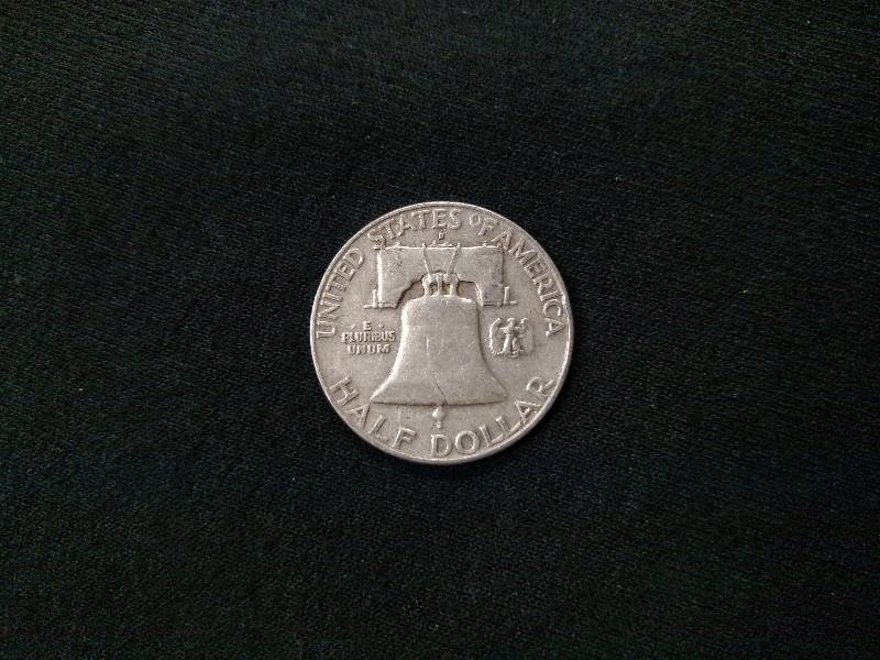 lot 112 image: 1958 D Franklin Silver Half Dollar...