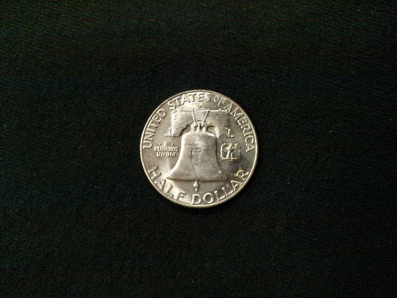 lot 116 image: 1963 Franklin Silver Half Dollar...