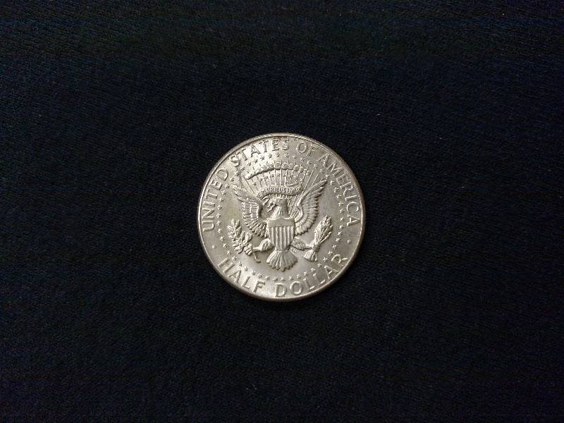 lot 119 image: 1964 Kennedy Silver Half Dollar...