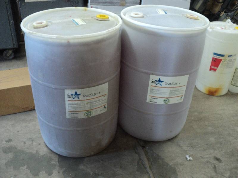 lot 17 image: 2 plastic barrels 3 high...