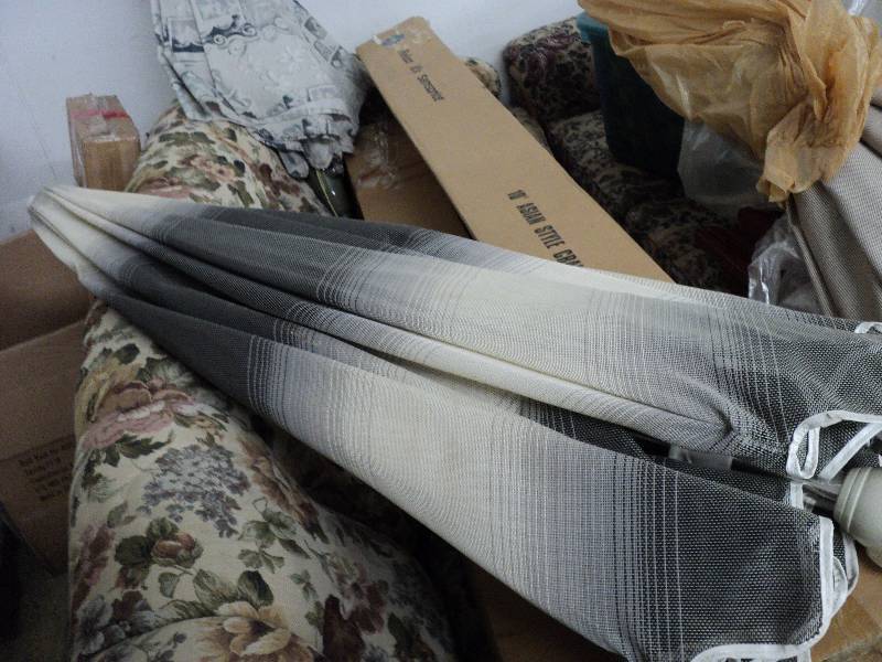 lot 31 image: 3 patio umbrella - no bottom pole...