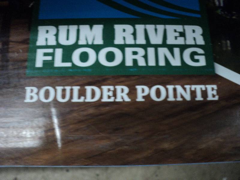 lot 39 image: 4 boxes Rum River flooring - vinyl ...