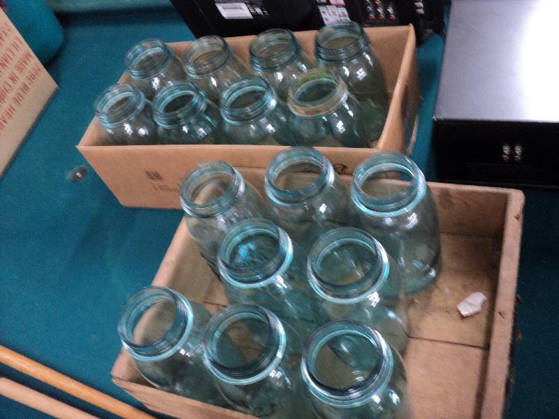 lot 55 image: 16 blue quart jars and 1 wood box...