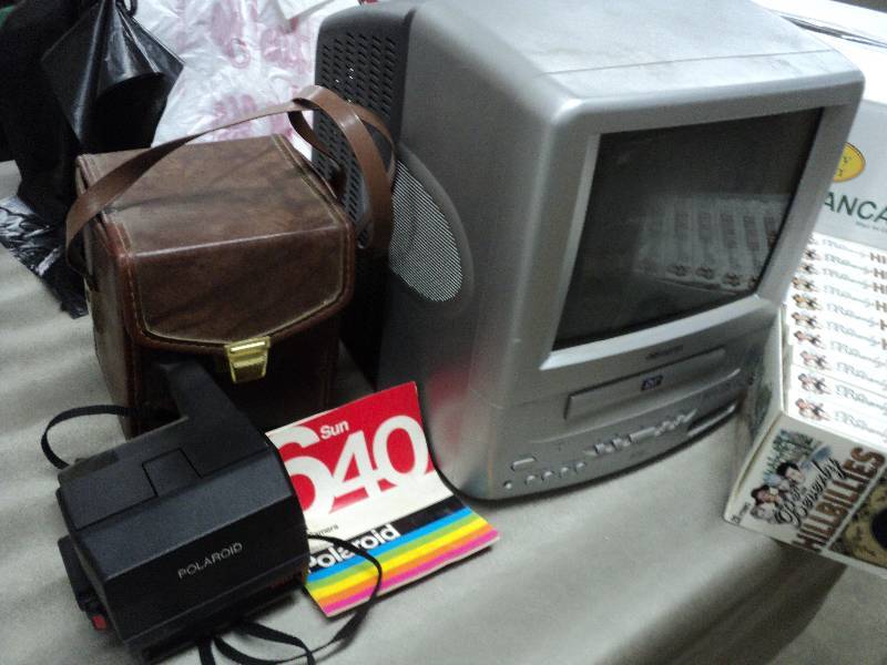lot 75 image: Polaroid Camera, T.V. and Beverly H...