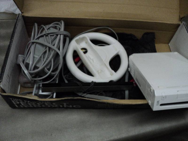 lot 87 image: WII Parts...