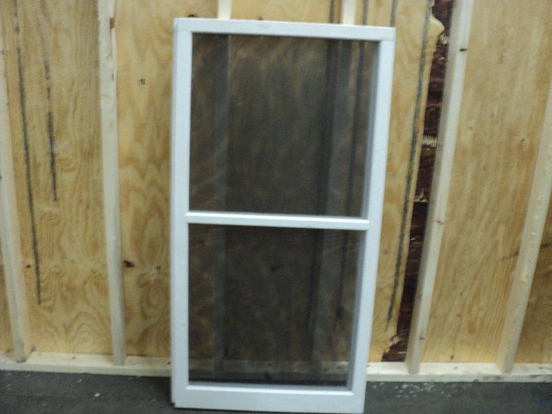 lot 203 image: 2 - 28x55 window screens...
