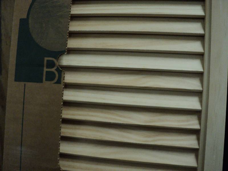 lot 204 image: Bi-fold door 24x79...