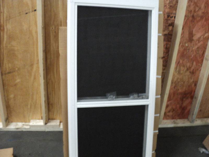 lot 209 image: 3 - 24x55 window screens...