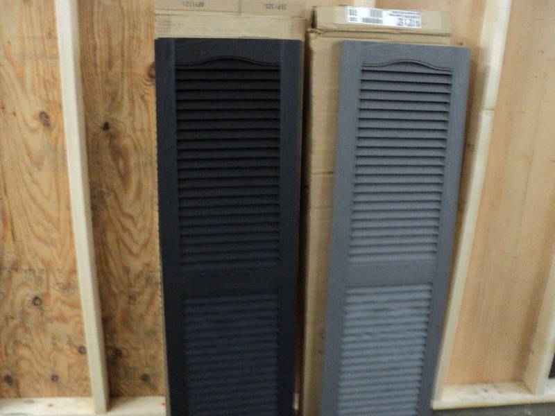 lot 215 image: 1 grey, 1 black 14.5x52 shutters...