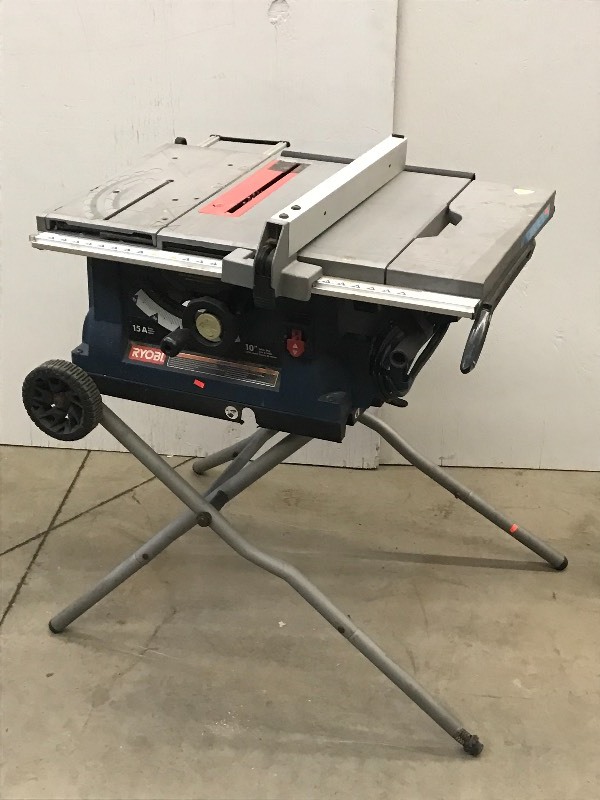 lot 4 image: Ryobi 10 Tablesaw With Portable Fo...