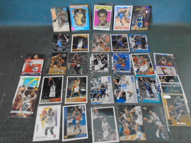 lot 72 image: Basketball Rookie , Star Guards & Vintage Calvin Murphy Cards