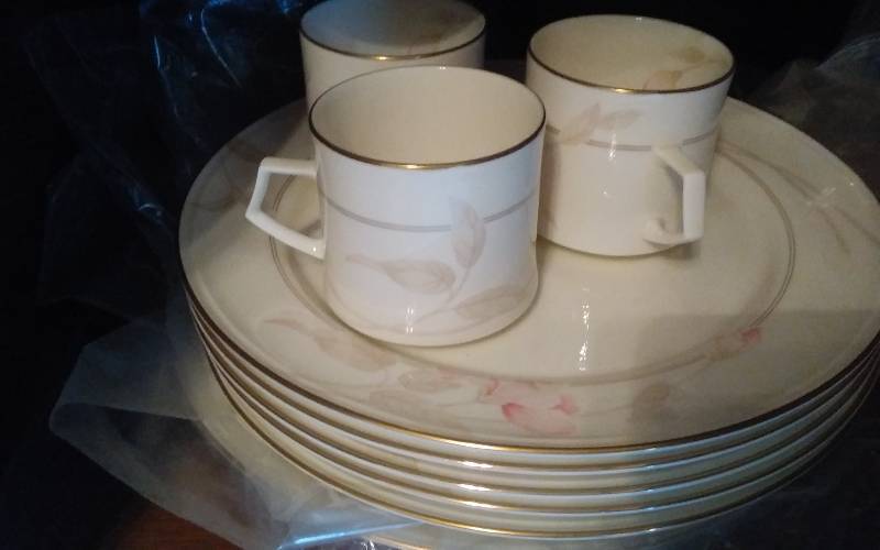 lot 2 image: All Contents Of The Hutch - Mikasa Ivory Bone China Set, Table Linens, Goblets, Candles, More