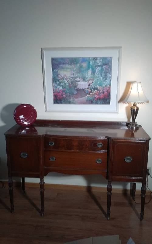lot 21 image: Vintage Side Board Buffet (19x60x41) Includes Picture By Charles Zhan, Lamp With Beaded Shade, Vase