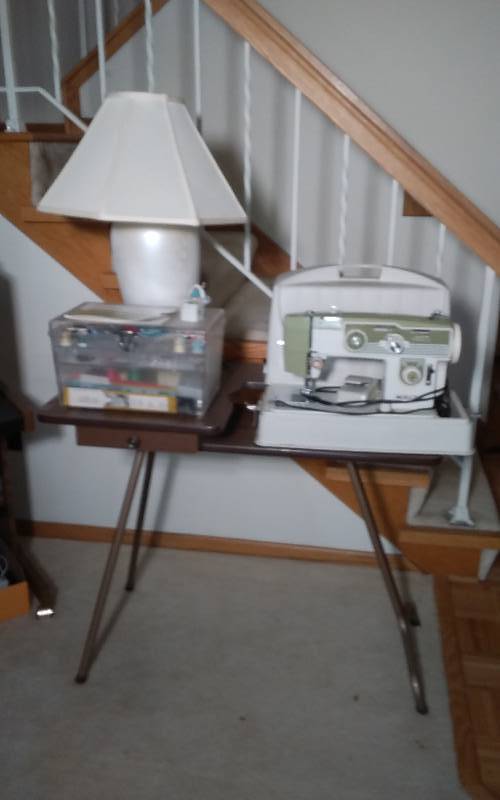 lot 41 image: White Portable Sewing Machine Model 675, Sewing Table, Sewing Notions, Lamp