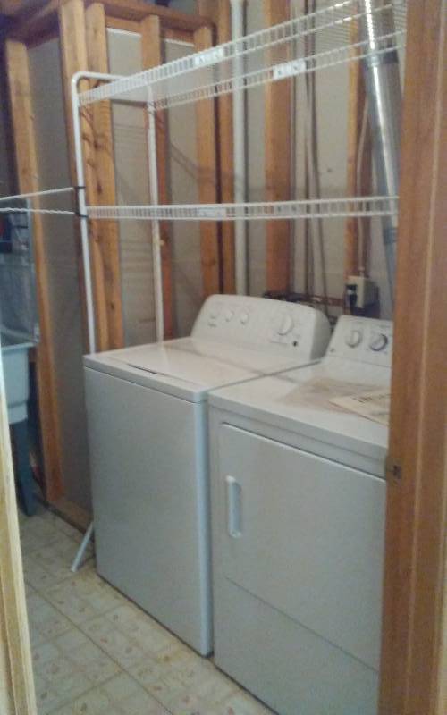 lot 56 image: Whirlpool Washing Machine (High Efficiency), GE Gas Dryer,  2-Tier Over Shelf