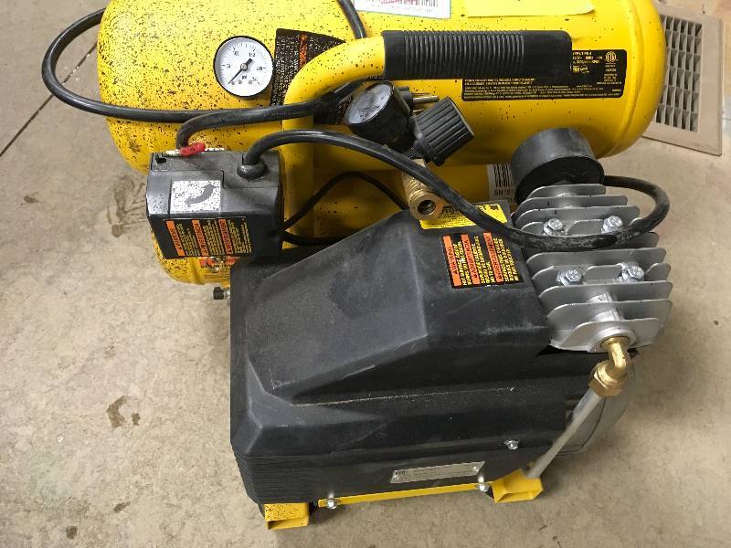 DeWalt 4 Gal. Portable Electric Air Compressor used in working condition