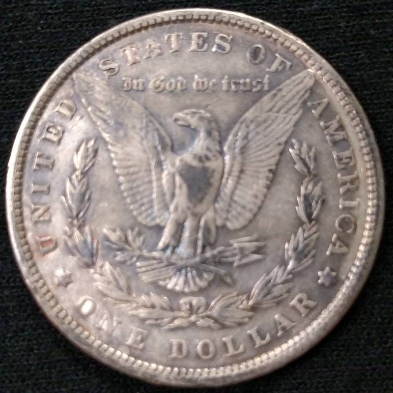 lot 4 image: 1879 Morgan Silver Dollar...
