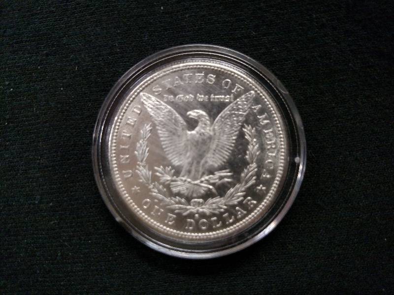 lot 6 image: 1880 S Morgan Silver Dollar...
