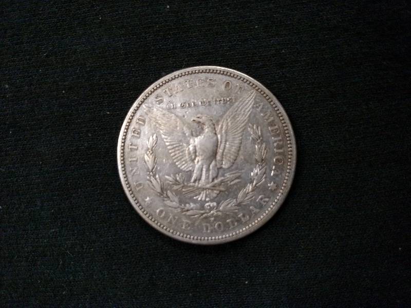 lot 5 image: 1879 S Morgan Silver Dollar...