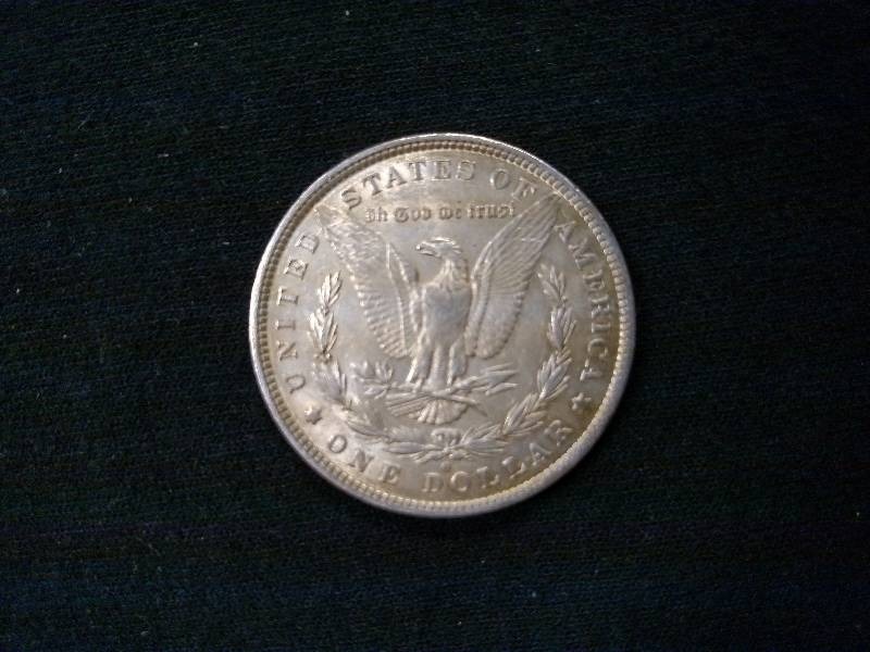 lot 7 image: 1881 O Morgan Silver Dollar...