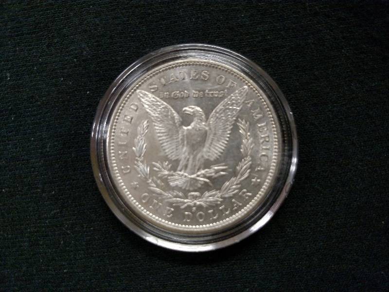 lot 8 image: 1881 S Morgan Silver Dollar...