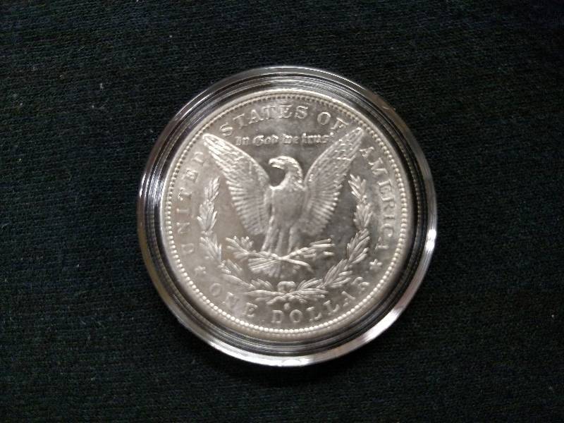 lot 11 image: 1882 S Morgan Silver Dollar...