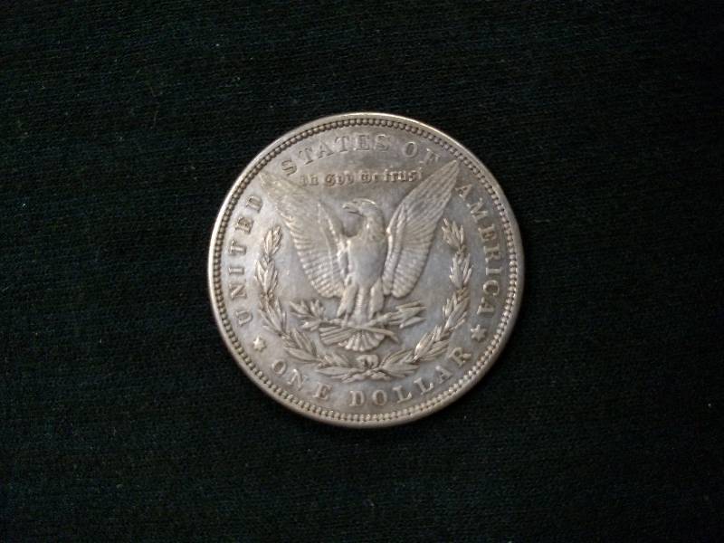 lot 12 image: 1884 Morgan Silver Dollar...