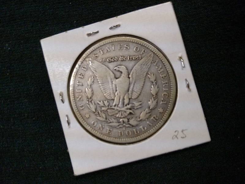lot 13 image: 1884 S Morgan Silver Dollar...