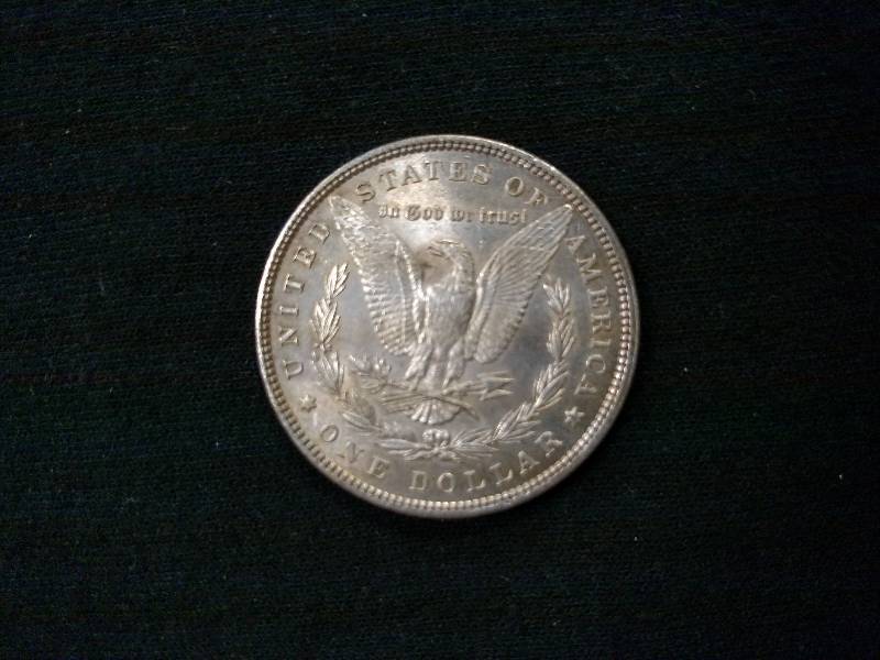 lot 17 image: 1886  Morgan Silver Dollar...