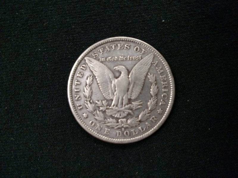 lot 21 image: 1891 S Morgan Silver Dollar...