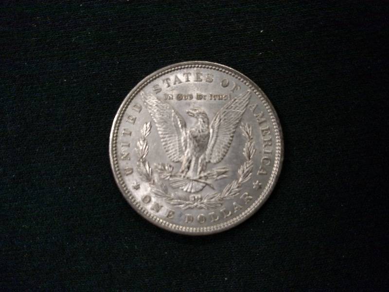 lot 24 image: 1896 Morgan Silver Dollar...