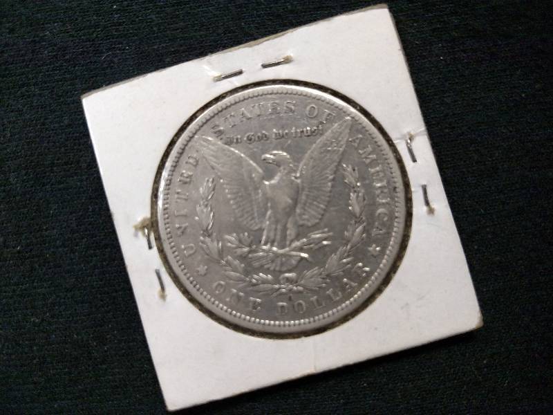 lot 25 image: 1896 O Morgan Silver Dollar...