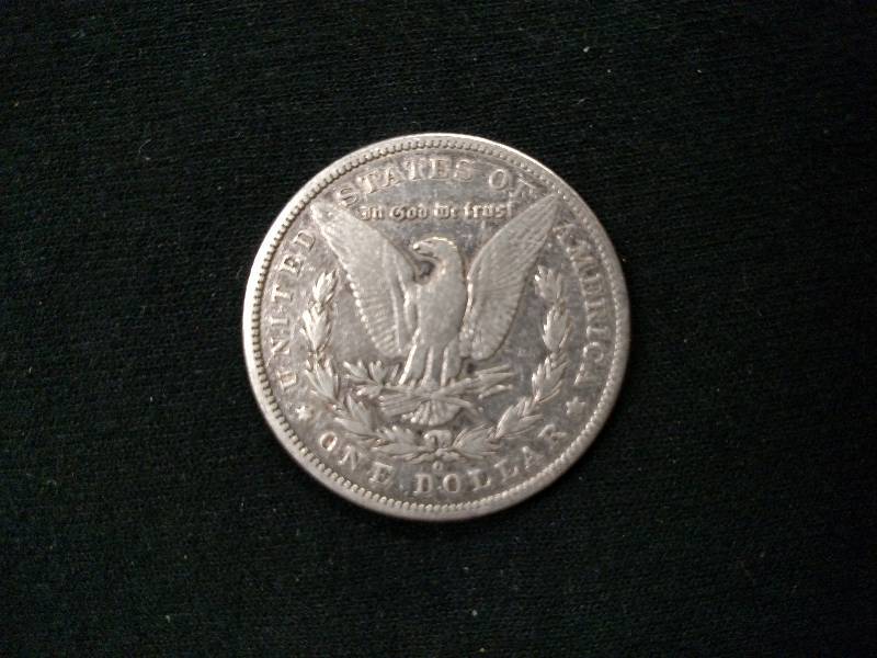 lot 27 image: 1899 O Morgan Silver Dollar...