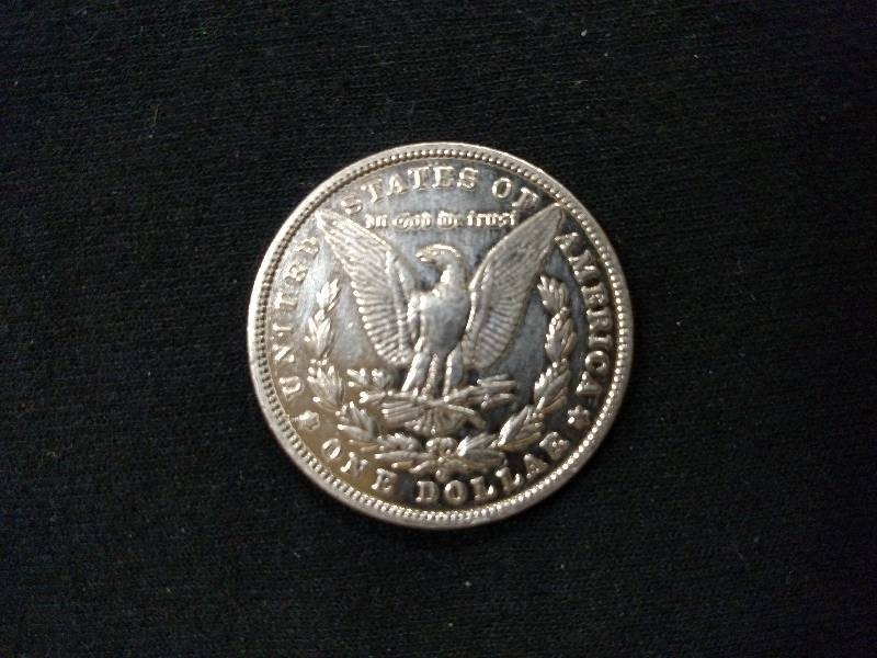 lot 30 image: 1900 O Morgan Silver Dollar...