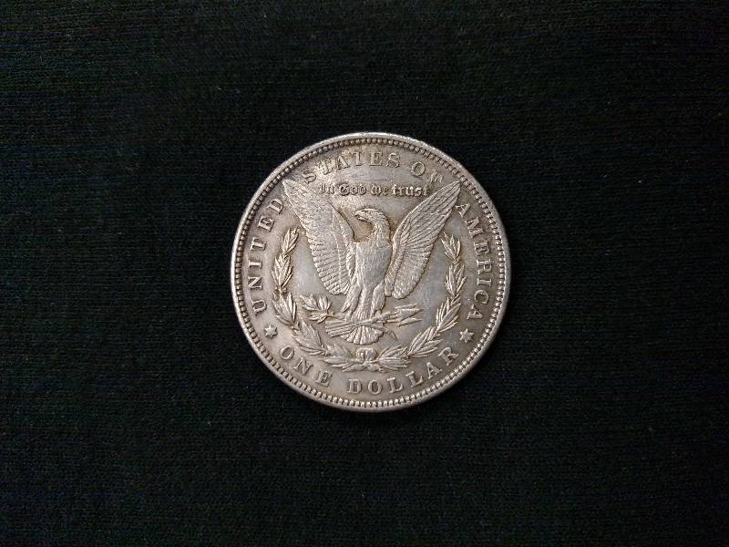 lot 28 image: 1900 Morgan Silver Dollar...