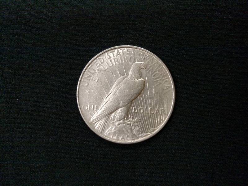 lot 42 image: 1922 Peace Silver Dollar...