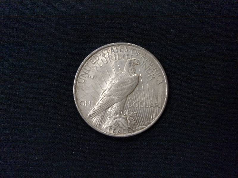 lot 44 image: 1922 Peace Silver Dollar...