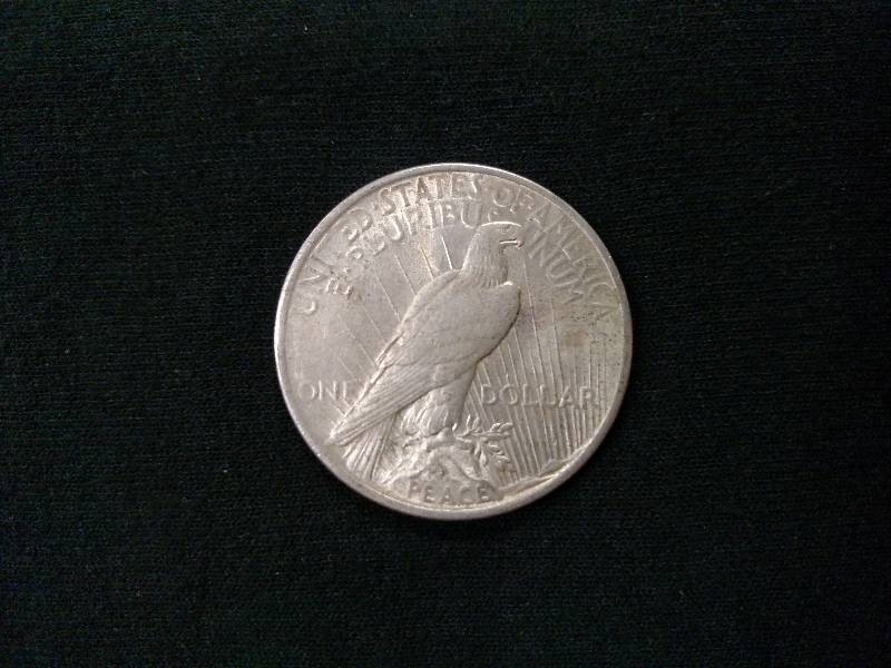 lot 45 image: 1922 Peace Silver Dollar...