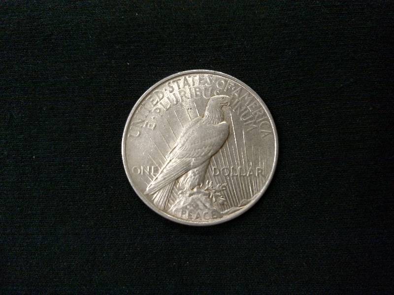 lot 46 image: 1922 Peace Silver Dollar...