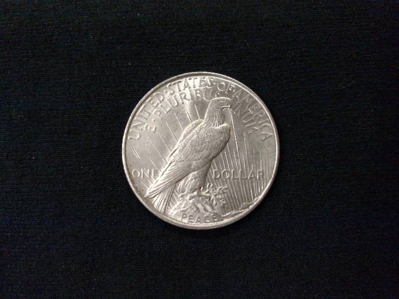 lot 47 image: 1922 D Peace Silver Dollar...