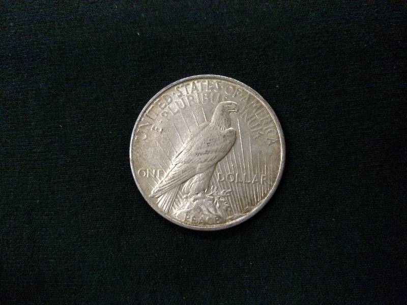 lot 48 image: 1922 D Peace Silver Dollar...
