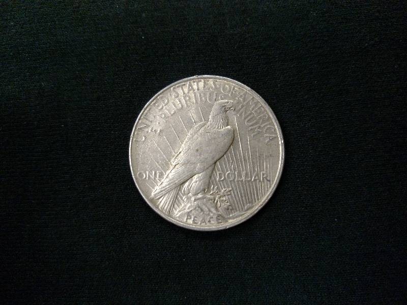 lot 49 image: 1922 D Peace Silver Dollar...