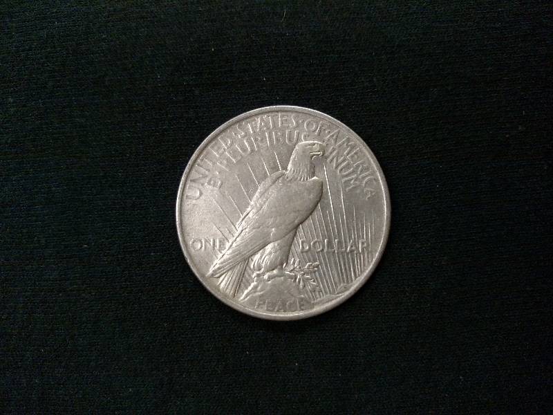lot 53 image: 1923 Peace Silver Dollar...