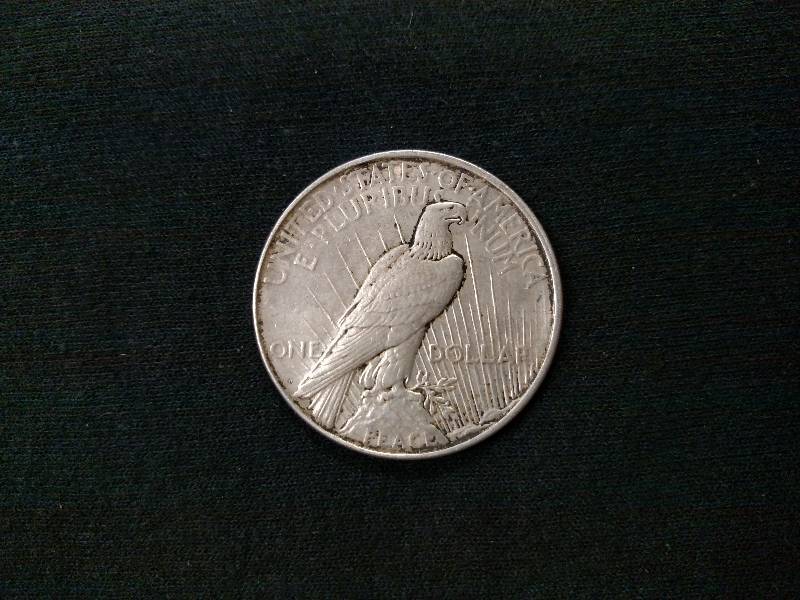 lot 54 image: 1923 D Peace Silver Dollar...