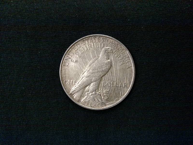 lot 55 image: 1923 D Peace Silver Dollar...